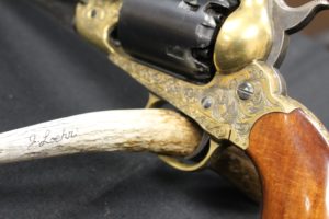 Closeup with elk antler holder.