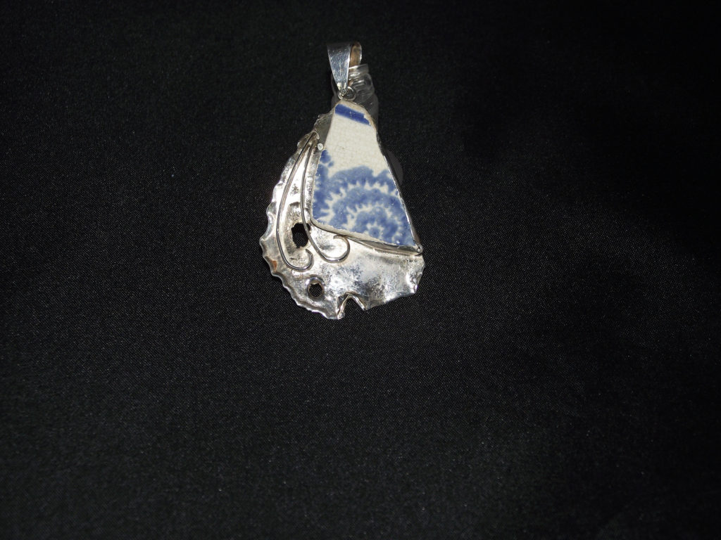 Potter Shard with Reticulated Silver.